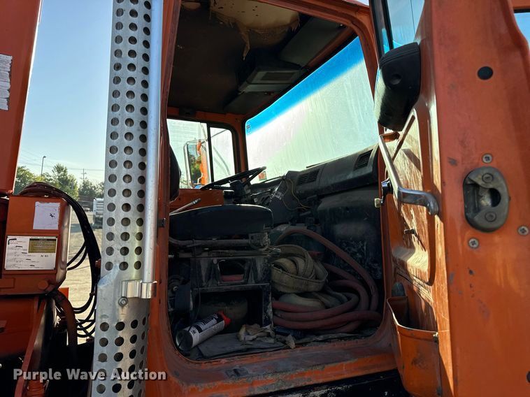 image for item DT2031 1997 Ford  LNT8000 flatbed truck with crane