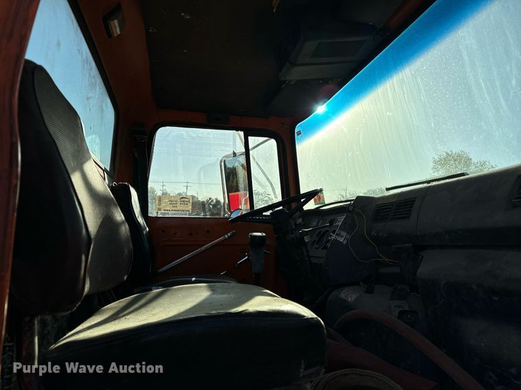 image for item DT2031 1997 Ford  LNT8000 flatbed truck with crane