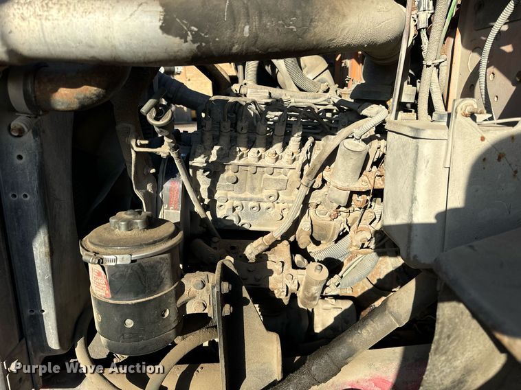 image for item DT2031 1997 Ford  LNT8000 flatbed truck with crane