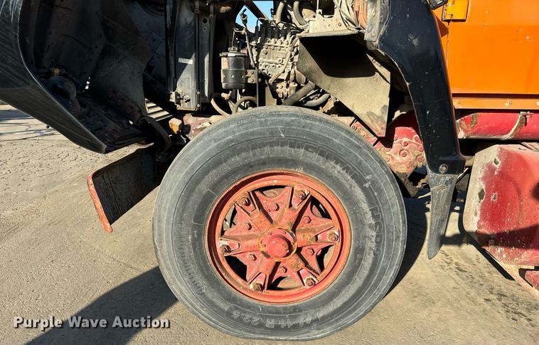 image for item DT2031 1997 Ford  LNT8000 flatbed truck with crane