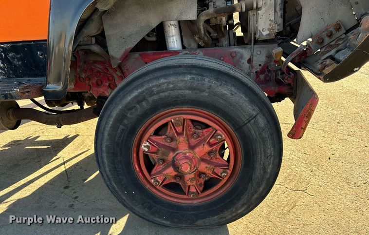 image for item DT2031 1997 Ford  LNT8000 flatbed truck with crane