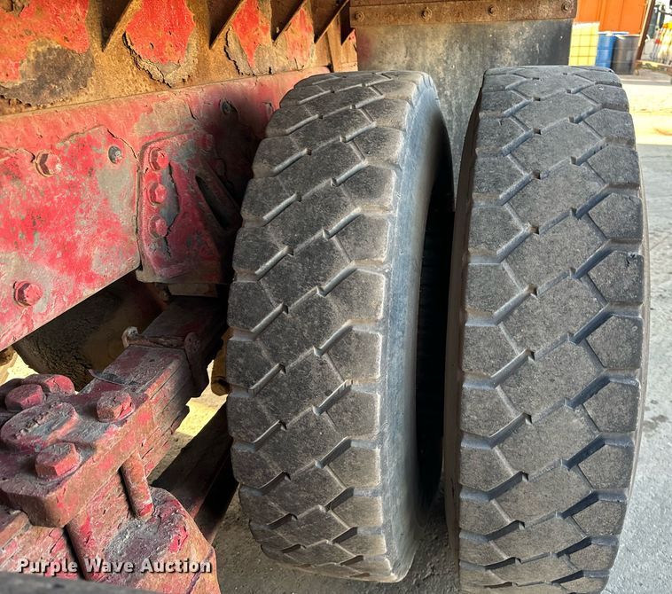 image for item DT2031 1997 Ford  LNT8000 flatbed truck with crane