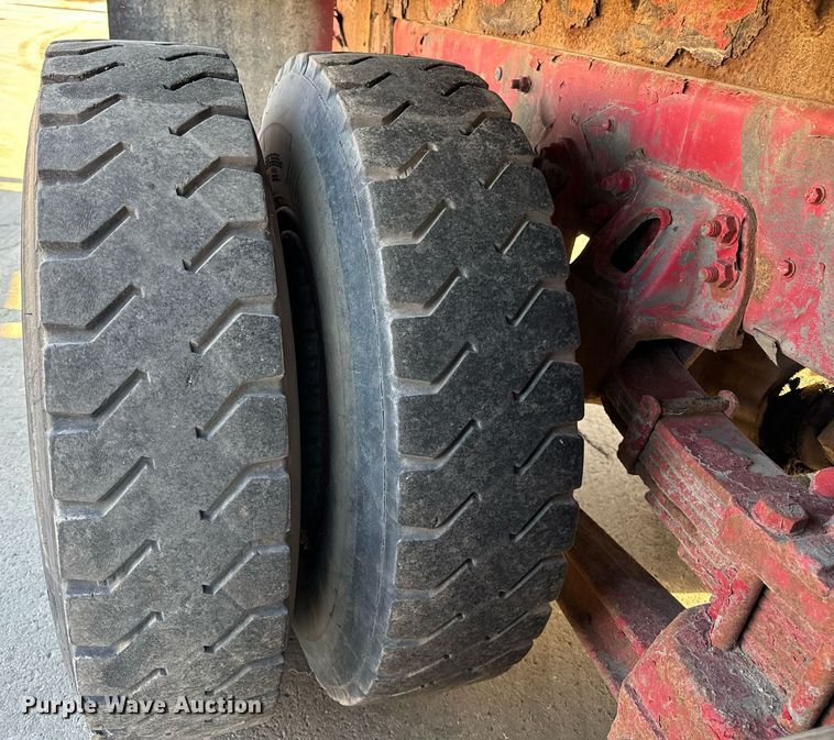 image for item DT2031 1997 Ford  LNT8000 flatbed truck with crane