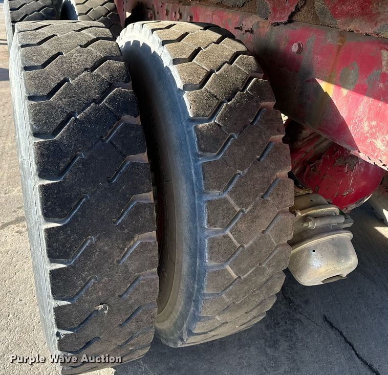 image for item DT2031 1997 Ford  LNT8000 flatbed truck with crane