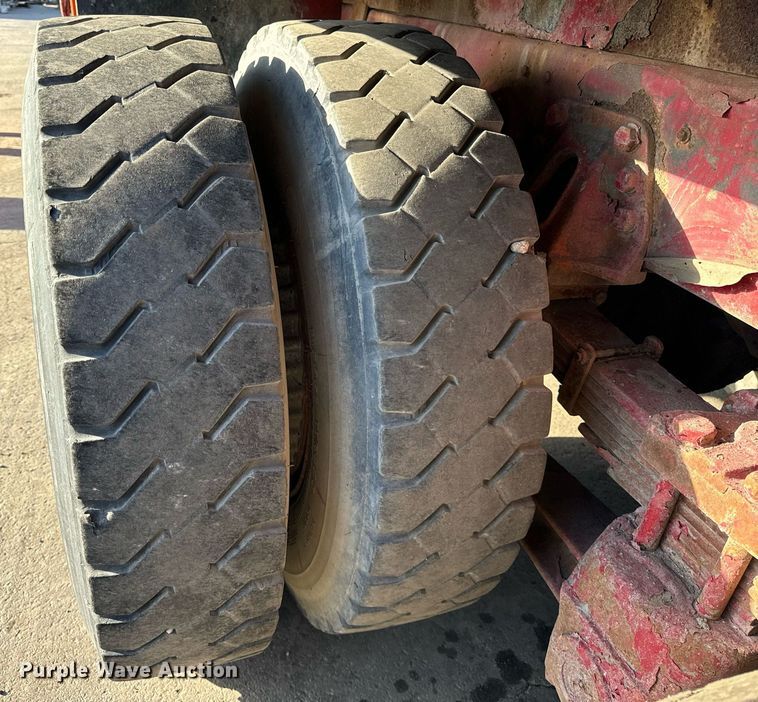 image for item DT2031 1997 Ford  LNT8000 flatbed truck with crane