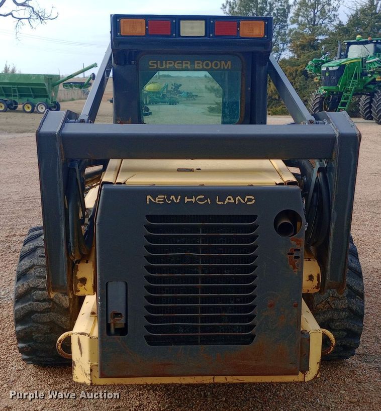 image for item DW0954 2002 New Holland LS190 skid steer loader