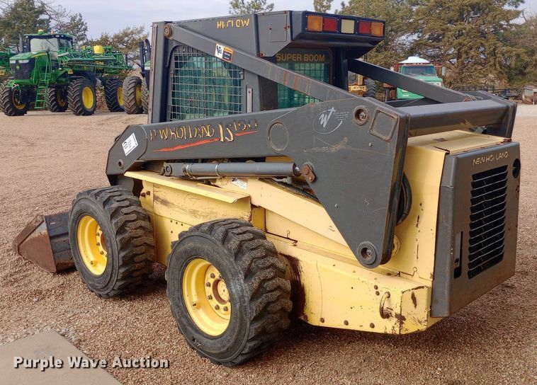 image for item DW0954 2002 New Holland LS190 skid steer loader