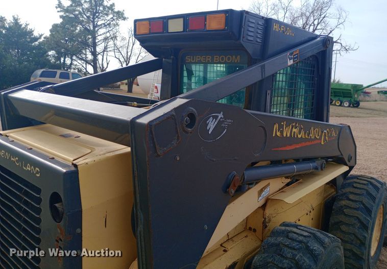 image for item DW0954 2002 New Holland LS190 skid steer loader