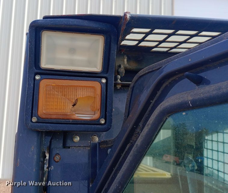 image for item DW0954 2002 New Holland LS190 skid steer loader
