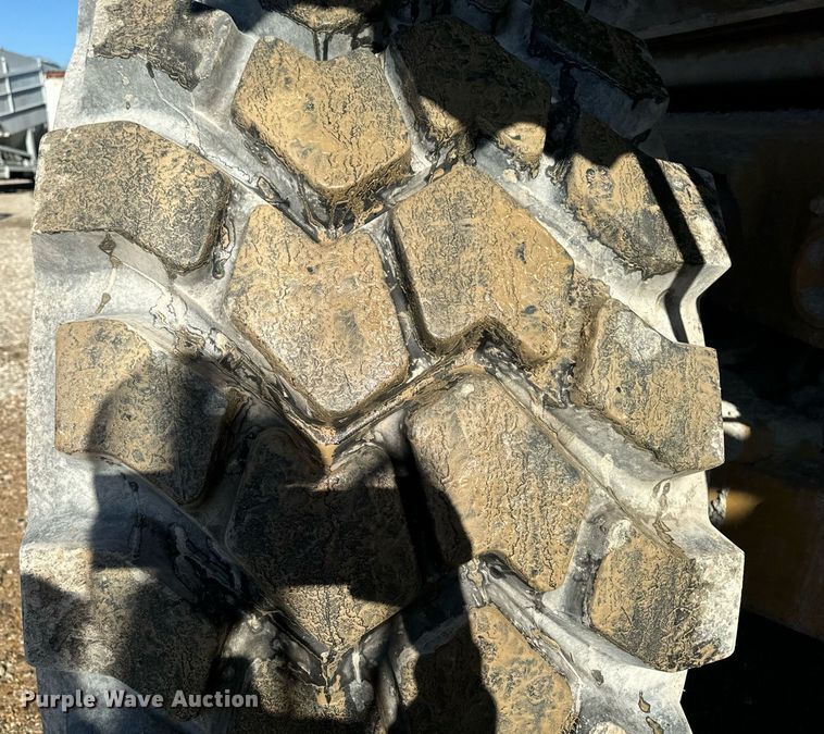 image for item DW2418 2004 Caterpillar 740 articulated haul truck