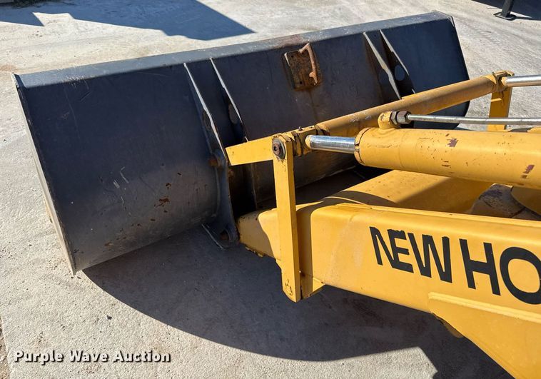 image for item EJ3371 1997 New Holland 555E backhoe
