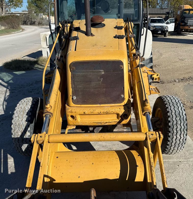 image for item EJ3371 1997 New Holland 555E backhoe