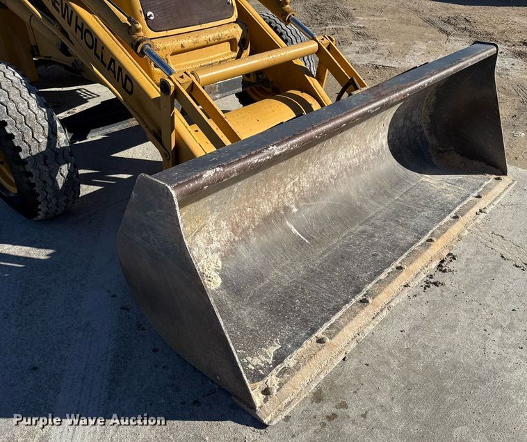 image for item EJ3371 1997 New Holland 555E backhoe