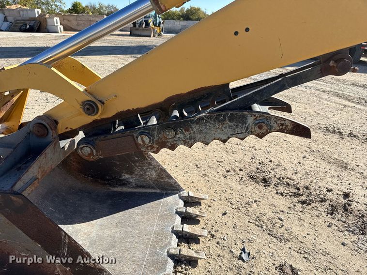 image for item EJ3371 1997 New Holland 555E backhoe