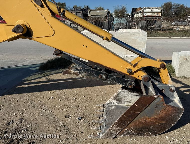 image for item EJ3371 1997 New Holland 555E backhoe