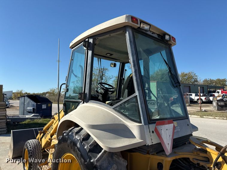 image for item EJ3371 1997 New Holland 555E backhoe