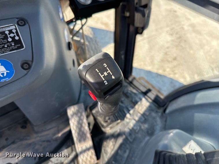 image for item EJ3371 1997 New Holland 555E backhoe