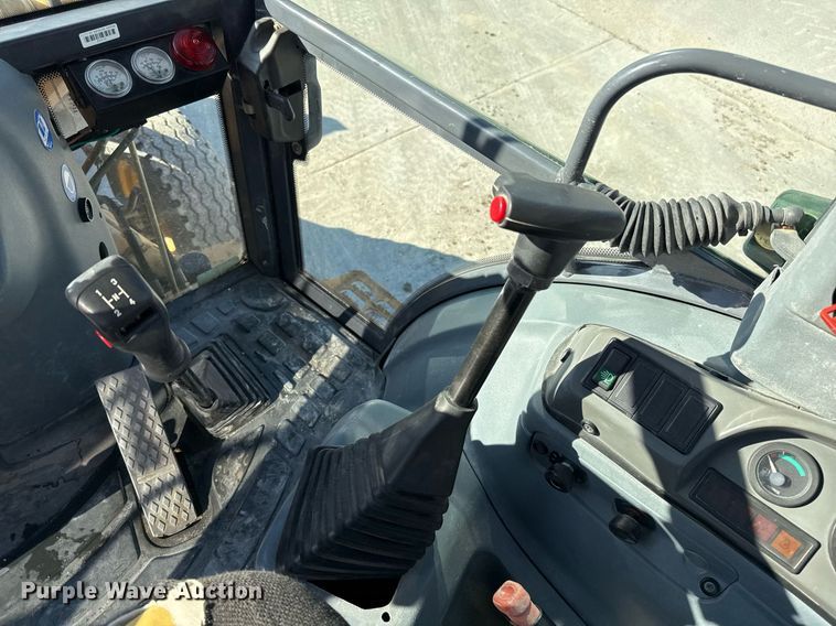 image for item EJ3371 1997 New Holland 555E backhoe