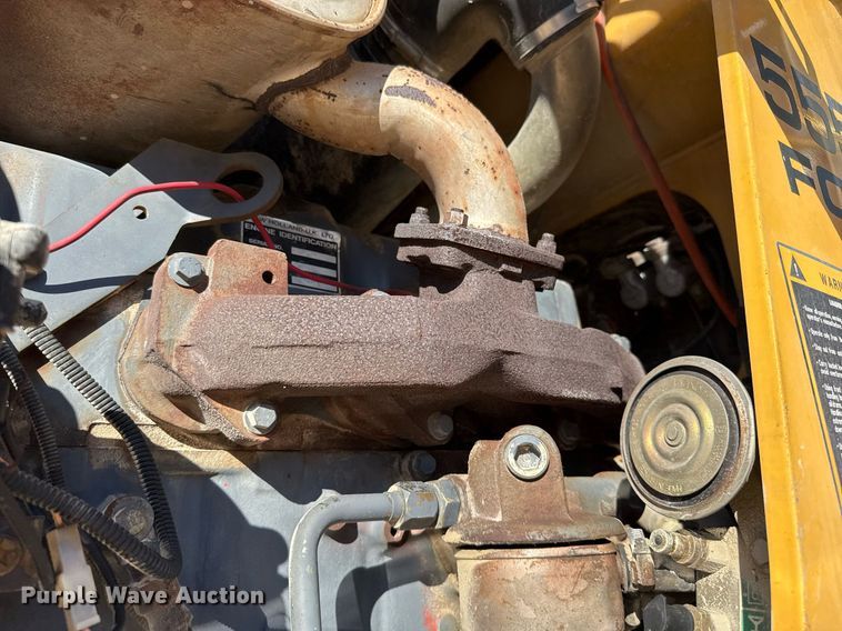 image for item EJ3371 1997 New Holland 555E backhoe