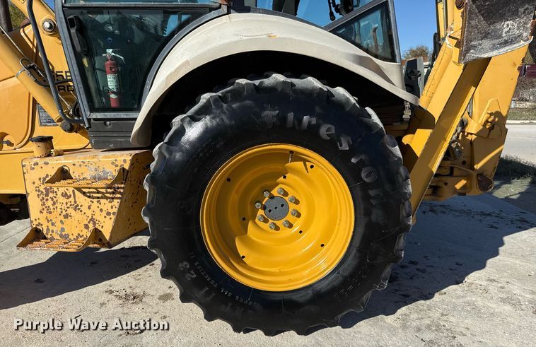 image for item EJ3371 1997 New Holland 555E backhoe