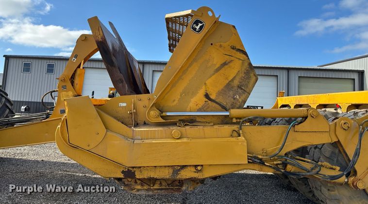 image for item EM0027 2012 John Deere 2112C scraper