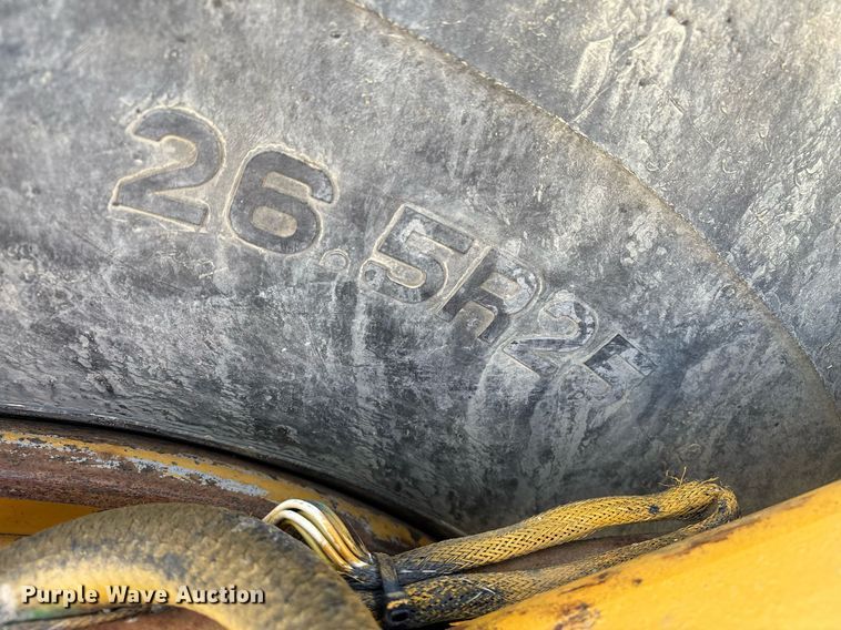 image for item EM0027 2012 John Deere 2112C scraper