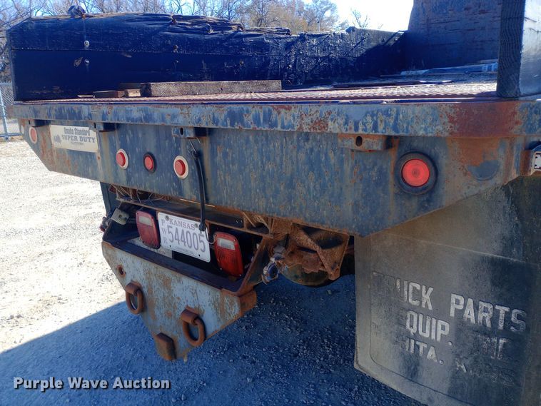 image for item EN8617 1998 Ford L8000 dump flatbed truck