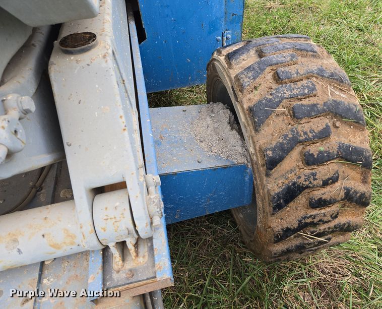 image for item EQ3680 2004 Genie  5390RT scissor lift
