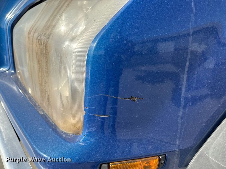 image for item EG7054 2015 Kenworth T880 roll-off container truck