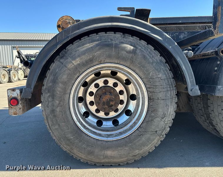 image for item EG7054 2015 Kenworth T880 roll-off container truck