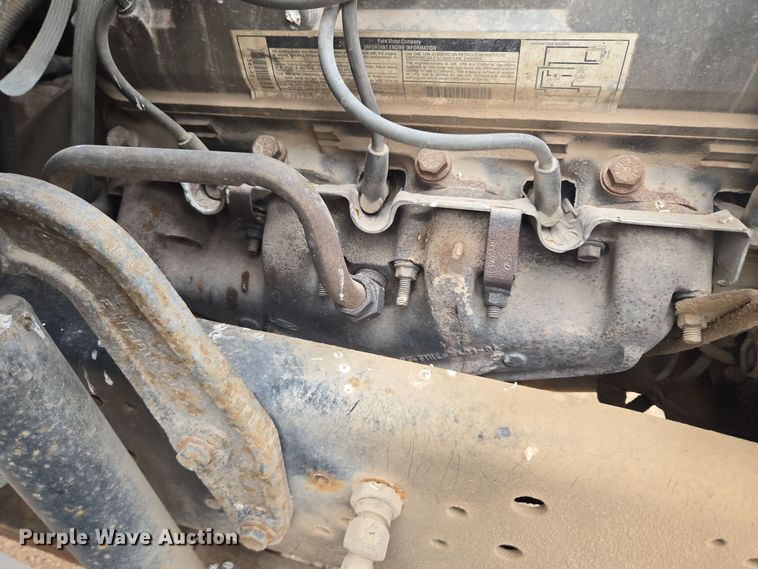 image for item ER5046 1995 Ford F700 spreader truck