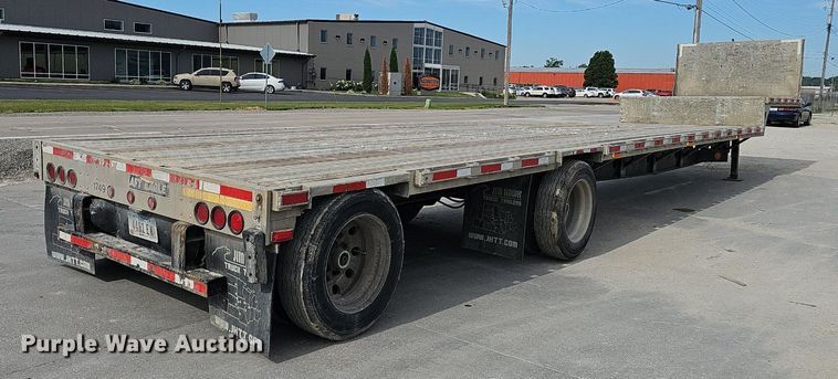 image for item IO9977 2001 Transcraft Eagle drop deck equipment trailer