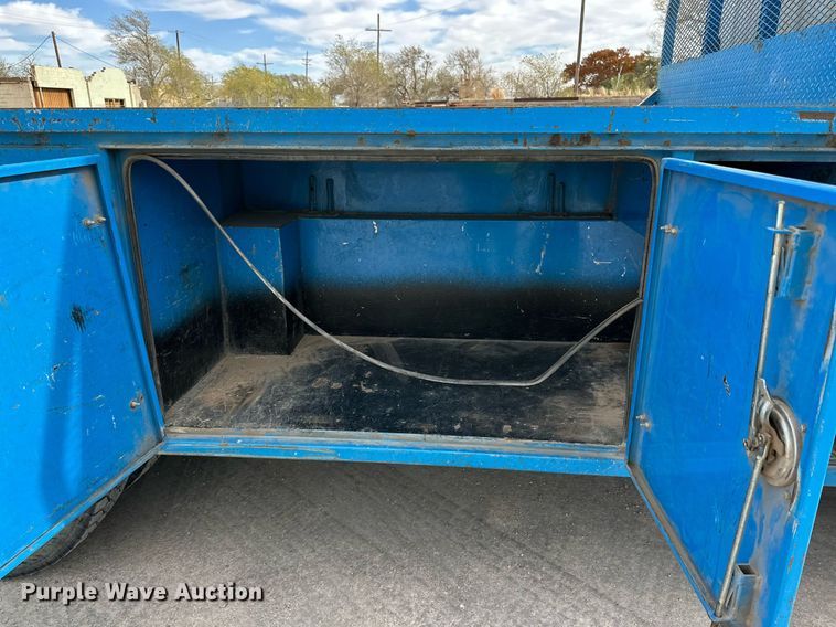 image for item DP6065 2013 Freightliner FL112 flatbed truck