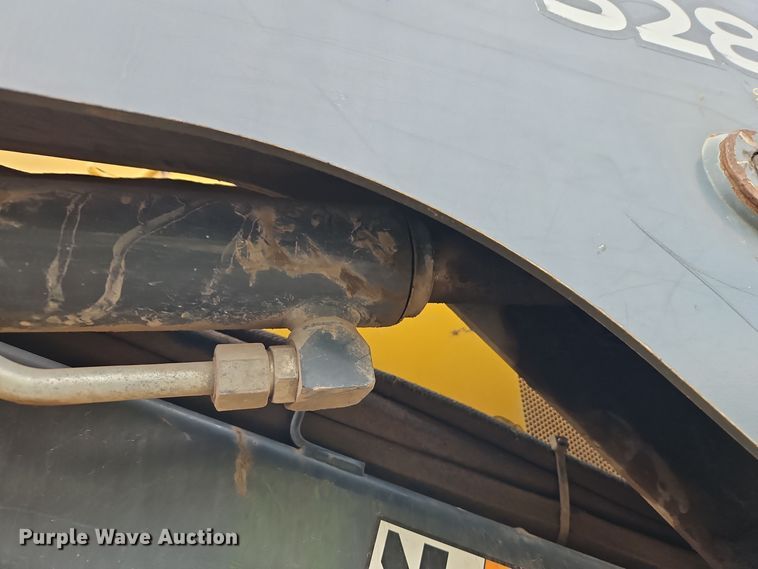 image for item DT7586 2014 John Deere 328E skid steer loader