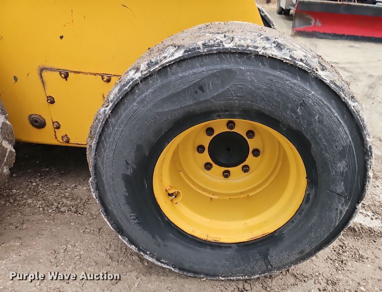 image for item DT7586 2014 John Deere 328E skid steer loader