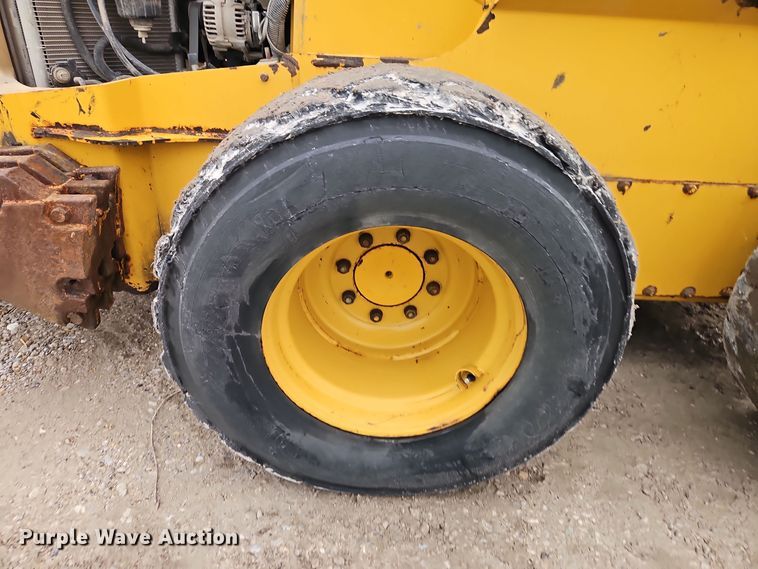 image for item DT7586 2014 John Deere 328E skid steer loader