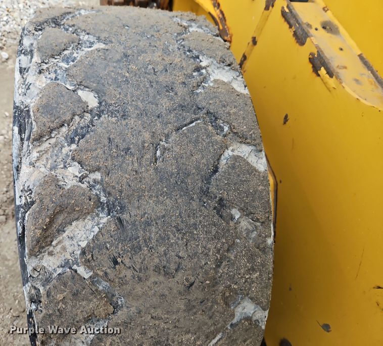 image for item DT7586 2014 John Deere 328E skid steer loader