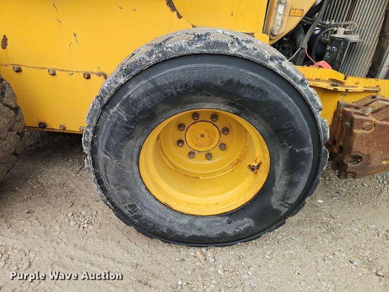 image for item DT7586 2014 John Deere 328E skid steer loader