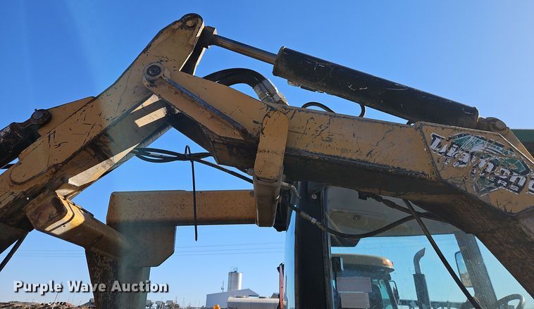 image for item EI8599 2013 John Deere 6115R MFWD tractor