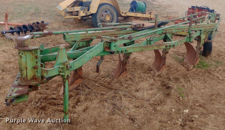 image for item EN8626 John Deere four bottom plow
