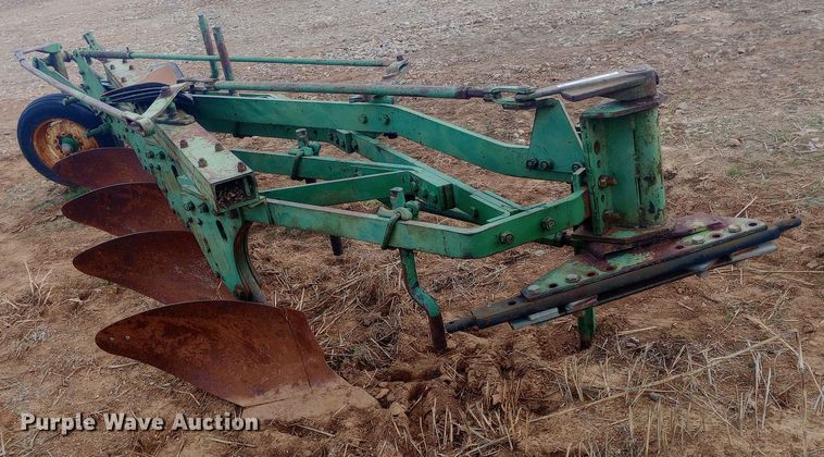 image for item EN8626 John Deere four bottom plow