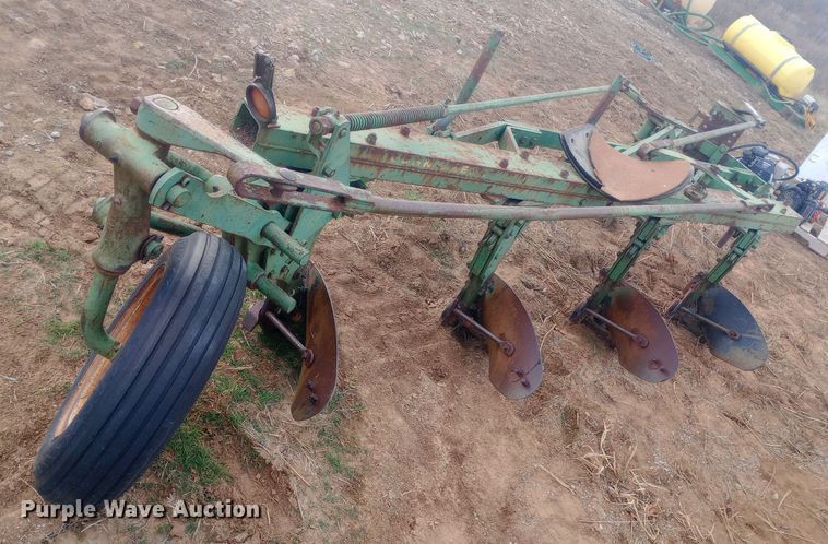 image for item EN8626 John Deere four bottom plow