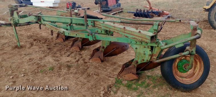image for item EN8626 John Deere four bottom plow
