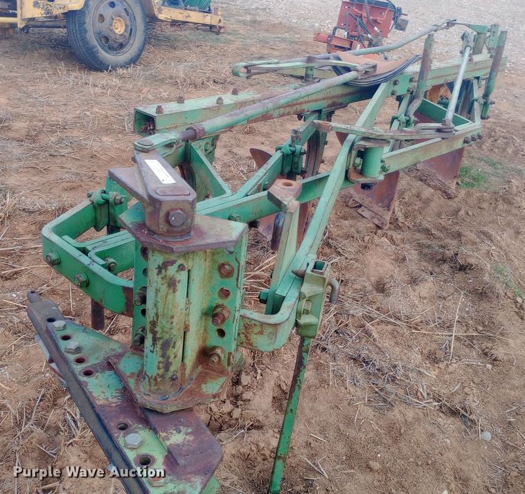 image for item EN8626 John Deere four bottom plow