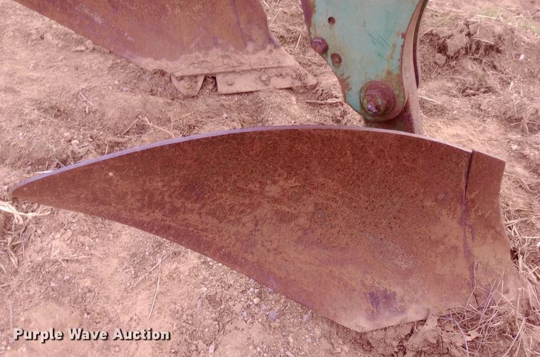 image for item EN8626 John Deere four bottom plow