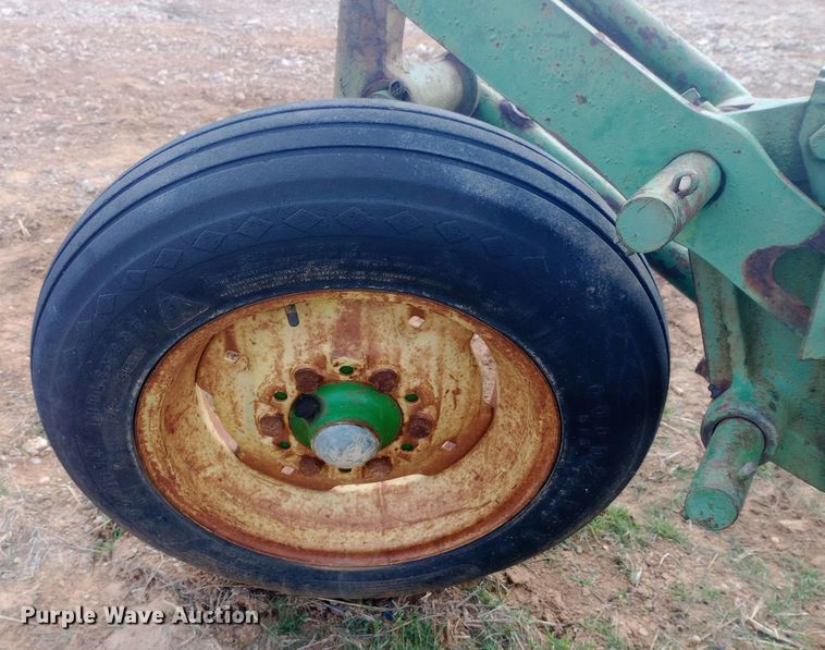 image for item EN8626 John Deere four bottom plow