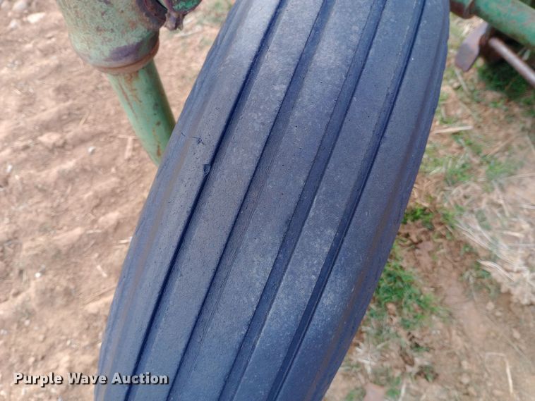 image for item EN8626 John Deere four bottom plow