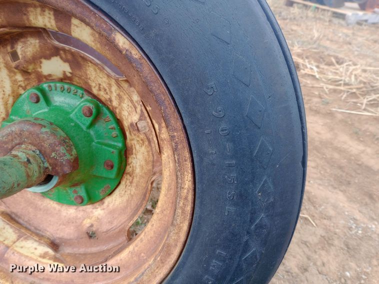 image for item EN8626 John Deere four bottom plow