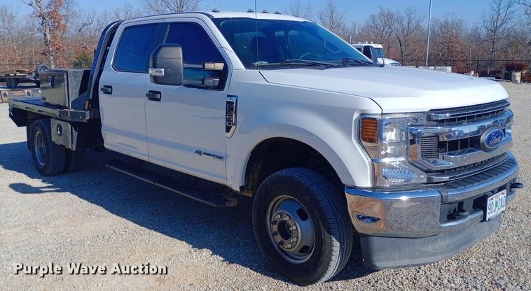 image for item EN8662 2020 Ford F350 Super Duty Crew Cab flatbed pickup truck