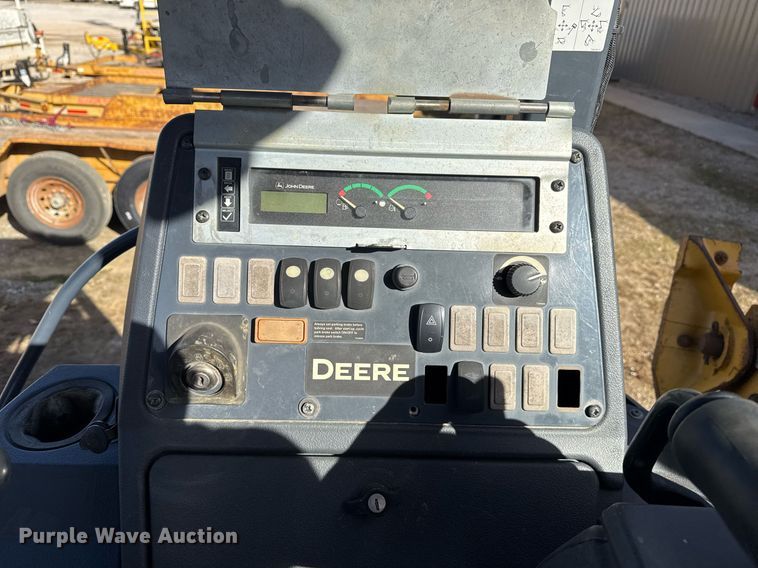 image for item DO7657 2014 John Deere 310K EP backhoe